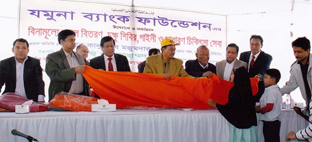 Kanutosh Majumder, Chairman of Jamuna Bank Limited inaugurating an Eye Camp at Rayerbagh in Dhaka recently organized by Jamuna Bank Foundation.. Nur Mohammed, Chairman of Jamuna Bank Foundation presided.