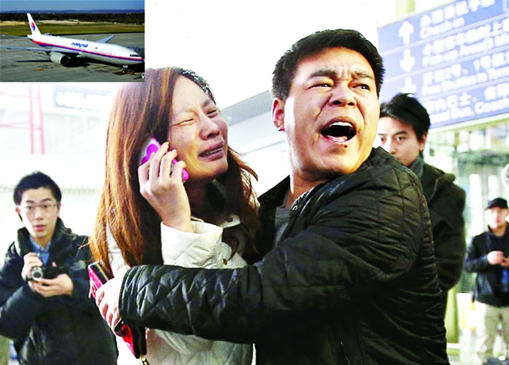 A Beijing-bound Malaysian Airlines plane that went missing with 239 people on board, including five Indians, today presumed crashed into the sea off Vietnam's southern Phu Quoc Island on Saturday. A relative (woman in white) of a passenger onboard Malays