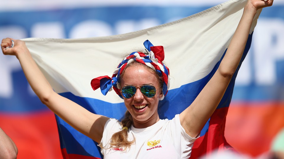 A Russia fan enjoys the atmosphere prior to the 2014 FIFA World Cup Brazil Group H match between Belgium and Russia at Maracana in Rio de Janeiro, Brazil on Sunday.