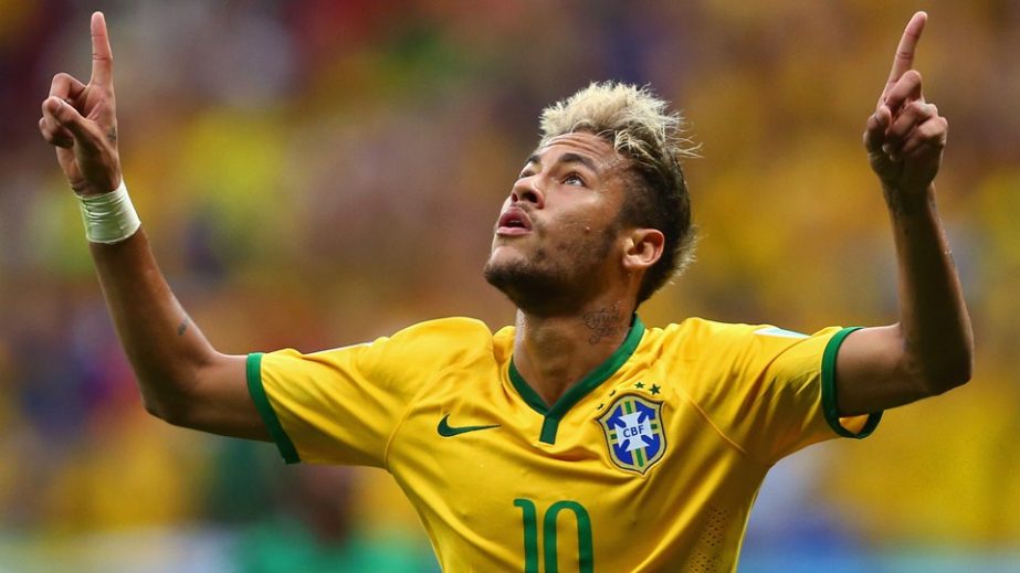 Neymar of Brazil celebrates scoring his team's second goal and his second of the game during the 2014 FIFA World Cup Brazil Group A match between Cameroon and Brazil at Estadio Nacional in Brasilia, Brazil on Monday.