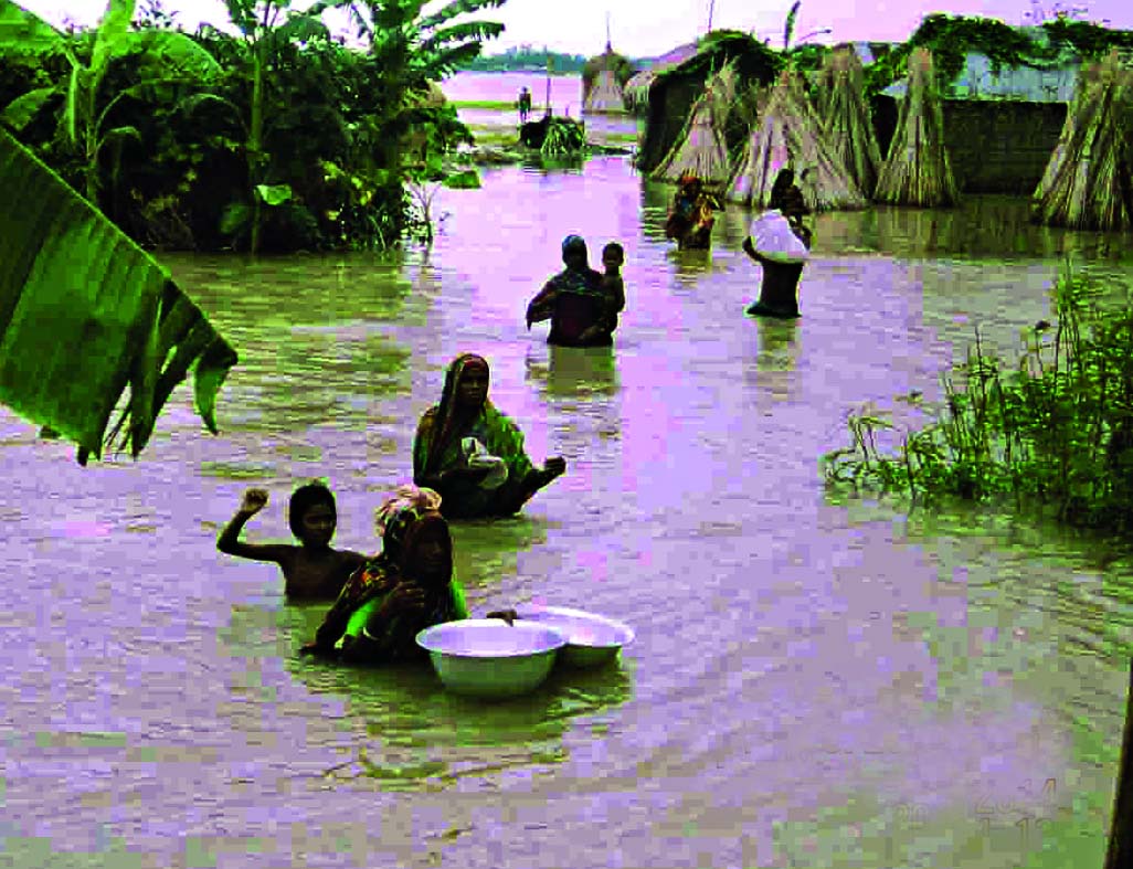 Thousands of people of Gaibandha are being marooned as flash floods and onrush of hilly waters increase due to torrential rains. This photo was taken from Sundarganj on Sunday