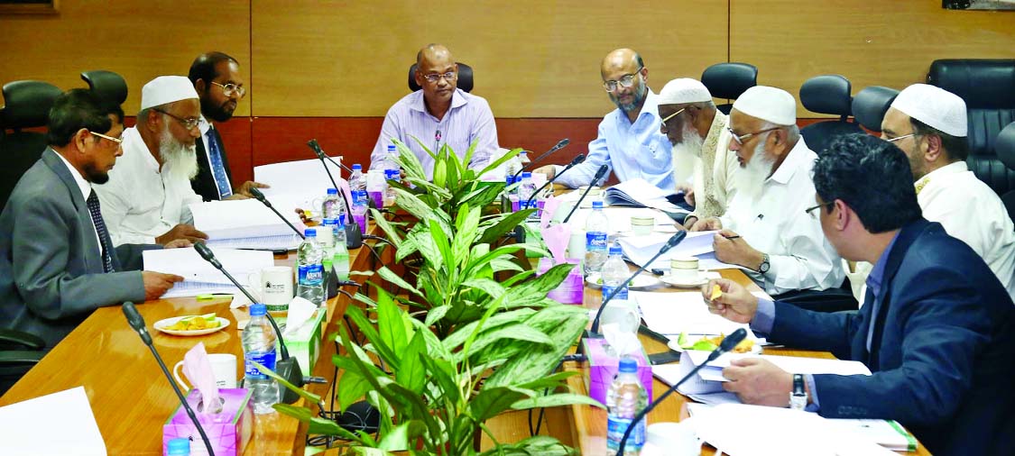 Abdus Samad, Chairman of the Board of Directors of Al-Arafah Islami Bank Limited, presiding over the 451st EC meeting at its head office on Thursday. Md Habibur Rahman, Managing Director of the bank was present.