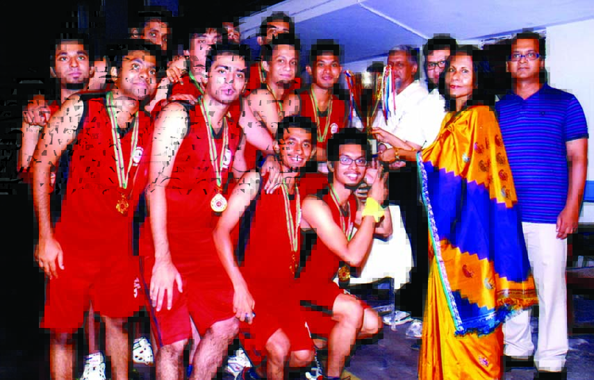 Prof. Khaleda Ekram, Vice-Chancellor of BUET handing over championship trophy of BUET Inter Hall Basketball competition 2014 to the team leader of Titumir Hall on Tuesday at the University gymnasium. Titumir Hall became champions beating Shahid Smrity Hal