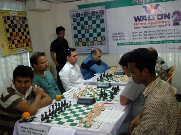 A scene from the fourth round match of the Walton Home Appliance Premier Division Chess League between Dhaka Mohammedan Sporting Club (left) and Sultana Kamal Smriti Pathagar (right) at the Media Centre of Bangladesh Olympic Association Bhaban on Saturday