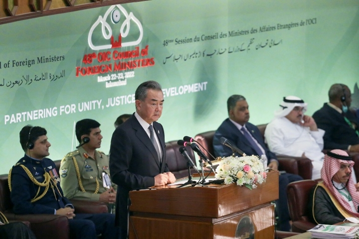 Chinese Foreign Minister Wang Yi addressing the 48th meeting of the Organisation of Islamic Cooperation (OIC) Council of Foreign Ministers in Islamabad [Saiyna Bashir/Reuters]