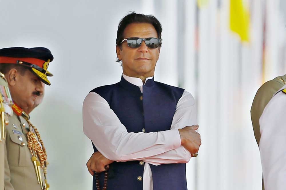 Presdent Imran Khan attends a military parade in Islamabad. Agency photo