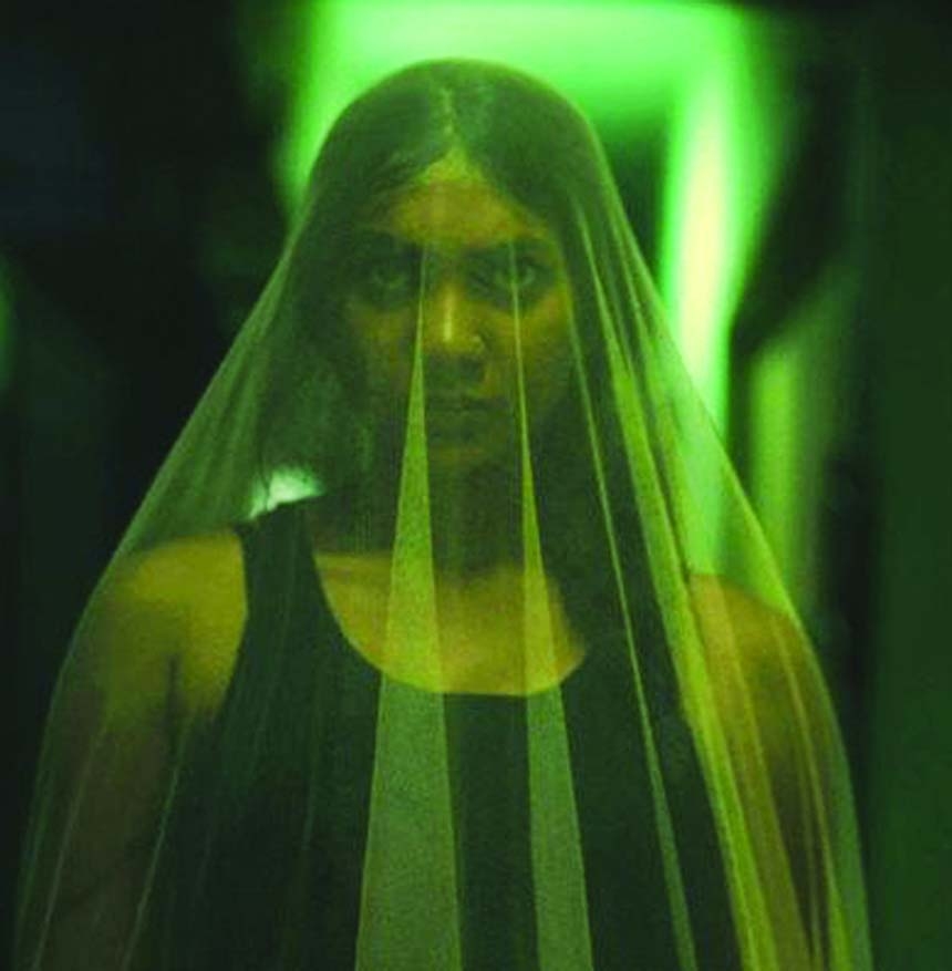 Sunerah Binte Kamal in a scene from movie Moshari