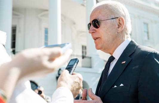 An interview of US President Joe Biden being taken Agency photo