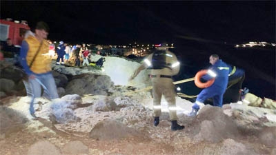 Greece Police recovering dead bodies of refugees who died in boat sinking.
