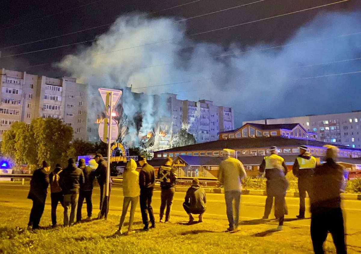 A view shows a site of a plane crash on residential building in the southern city of Yeysk, Russia on Monday. Agency photo