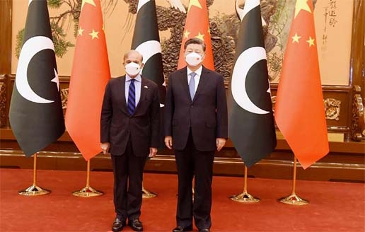 Pakistan Prime Minister Shahbaz Sharif poses for a photograph along with China's President Xi Jinping prior to their talks at the Great Hall of the People in Beijing, China on Wednesday.