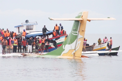 Rescuers attempt to recover the Precision Air passenger plane that crashed into Lake Victoria in Bukoba, Tanzania, on Sunday.