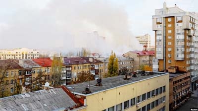 Smoke rises near a local railway administration headquarters damaged in shelling in the course of Russia-Ukraine conflict in Donetsk, Russian-controlled Ukraine on Monday.