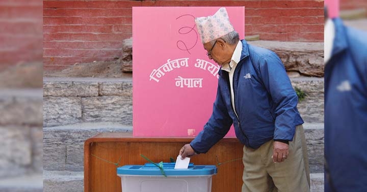 A man casts his vote during the general election in Lalitpu, Nepal on Sunday. Agency photo