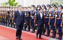 Chinese President Xi Jinping and Philippine President Ferdinand Marcos Jr review the honour guard during a welcome ceremony at the Great Hall of the People in Beijing, China on Wednesday.