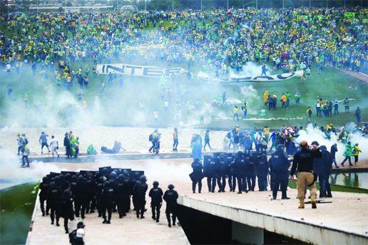 Supporters of Brazil's former President Jair Bolsonaro demonstrate against President Luiz Inacio Lula da Silva outside Brazil's National Congress in Brasilia on Monday.