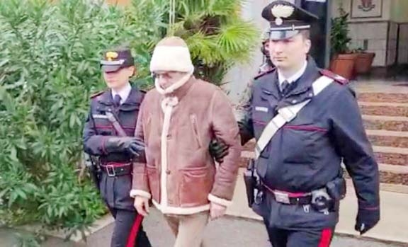 A screengrab taken from a video shows Matteo Messina Denaro the country's most wanted mafia boss being escorted out of a Carabinieri police station after he was arrested in Palermo, Italy on Monday. Agency photo