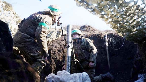 A Ukrainian soldier looks out from a tank, amid Russia's invasion of Ukraine, in the frontline city of Lyman, Donetsk region. Agency photo