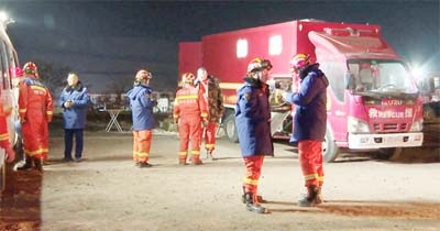 Rescue workers are seen at the site of a collapsed coal mine in Alxa League, Inner Mongolia Autonomous Region, China, in this screengrab taken from a video shot on Thursday.