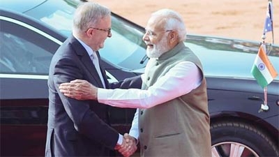 Australian Prime Minister Anthony Albanese shakes hands with his Indian counterpart Narendra Modi during his ceremonial reception at the forecourt of India's Rashtrapati Bhavan Presidential Palace in New Delhi, India on Friday.
