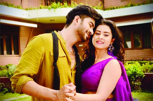 Ziaul Roshan and Shobnom Bubly in a scene from the movie 'Tumi Jekhane Ami Sekhane' at a photo session