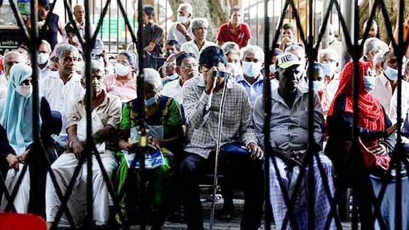 Patients wait for doctors near a waiting area at a hospital during the general strike, in Colombo, Sri Lanka on Wednesday.Agency photo