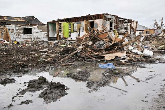 A damaged home is seen on the day after a tornado hit Sullivan, Indiana, US on Saturday. Agency photo